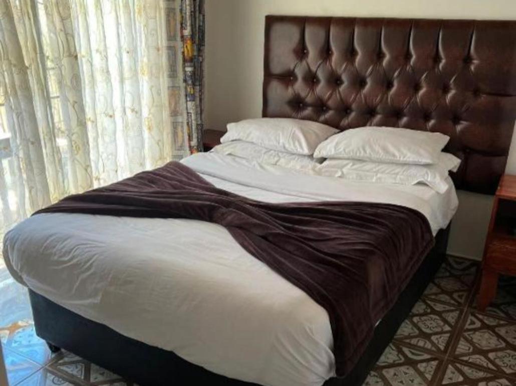 Victoria Guest Lodge Bellville Rum bild